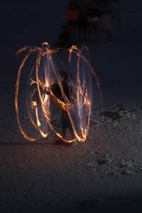 artits playing with fire on clearwater beach